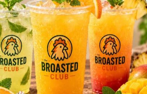 Fresh orange juices in Broasted Club cups